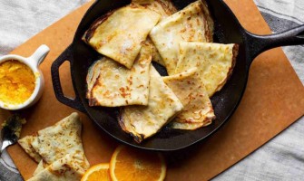 Tortitas con mantequilla de naranja y brandy